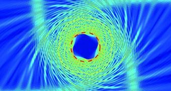 An air-GaInAsP metamaterial mimics a photon-sphere, one of the key black hole phenomena in its interactions with light