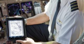 United Continental Holdings pilot holding an Apple iPad