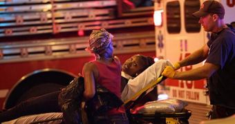 EMTs transport victims after a shooting on Chicago's South Side
