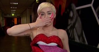 Miley Cyrus can't help being controversial and drops a curse in the middle of her acceptance speech