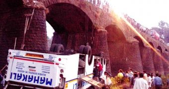Bus swerves off bridge, catapults into river in India