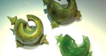 "Lingling-o" earrings found in Vietnam (left) and the Philippines (both right) are made of a jade coming from a single site in eastern Taiwan.