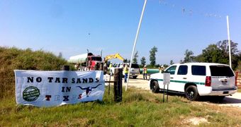 7 Arrested After Chaining Themselves to a Truck to Protest Oil Pipeline