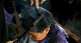 72-Year-Old Barber in China Uses Super Hot Metal Tongs to Cut Hair