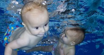 Babies smile while they are swimming