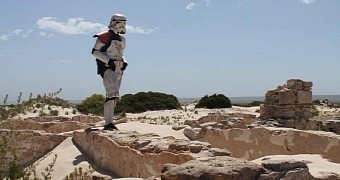 A man is walking across Australia wearing a Stormtrooper costume