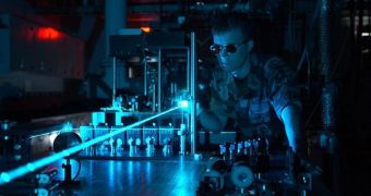Photons in are the basic components of laser beams