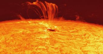 These plasma filaments hang in magnetic field lines, after a solar flare released on September 22, 2011