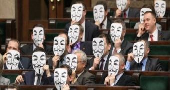 Members of the Polish Parliament wearing Guy Fawkes masks