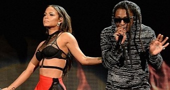 Christina Milian comes out with Lil Wayne at the AMAs 2014 to premiere collaboration