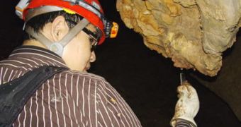 New College graduate Nam Nguyen is researching microbes in the inner recesses of Kartchner Caverns