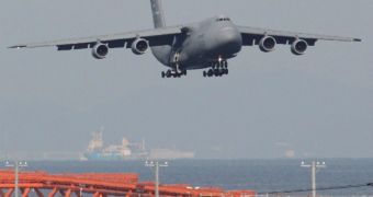 A USAF C-5 transport aircraft carrying the Global Precipitation Measurement (GPM) Core Observatory landed at Kitakyushu Airport in Japan on November 23