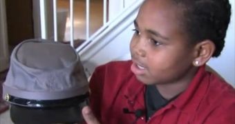 Nine-year-old Jacob and the Confederate hat he won at school