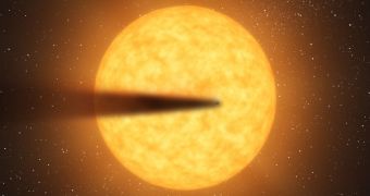 A rendition of the newly found, disintegrating exoplanet, passing in front of its parent star