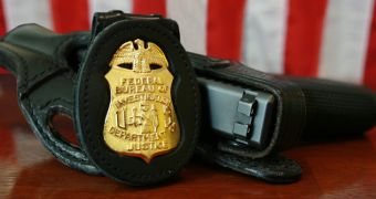 FBI badge and service pistol