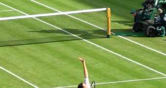 The standard tennis serving position could pose serious health risks for amateur players