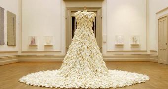 Wedding dress manufactured out of 1,400 plastic gloves