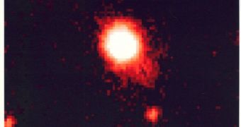 This image shows a very distant quasar, of the kind that may have helped heat up the early Universe