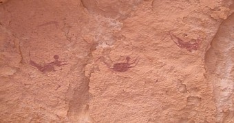 Ancient cave paintings show people diving and swimming