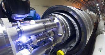 CERN engineer welding LHC magnets