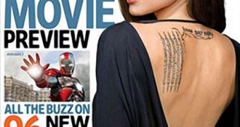 Angelina Jolie flashes back tattoos for EW to promote upcoming “Salt” film