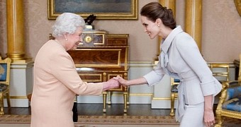 Angelina Jolie receives her title of honorary dame from the Queen