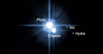 This is the dwarf planet Pluto and its three moons