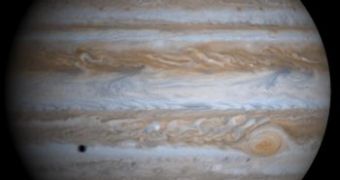 Jupiter, the gas giant that protects the Earth by drawing dangerous asteroids into its atmosphere