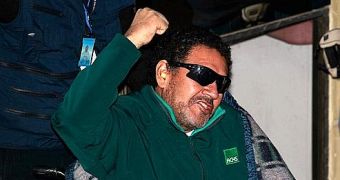 Presumably one of the rescued Chilean miners wearing wraparound sunglasses for protection from the camera lights
