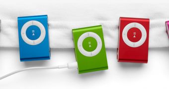 iPod shuffle “now clips on in more vibrant blue, green, pink, and red”