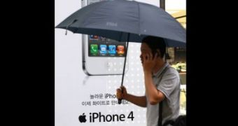 A South Korean talking on his iPhone