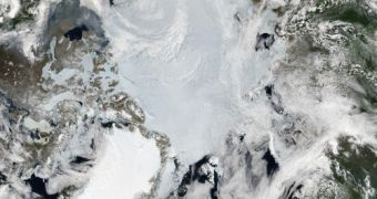 MODIS sees few clouds over the Arctic Circle