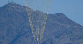 A picture of NASA's dummy payload being directed by the drogue parachute during the Arizona tests