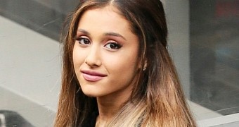 Ariana Grande arrives in London and for once, ditches her trademark ponytail