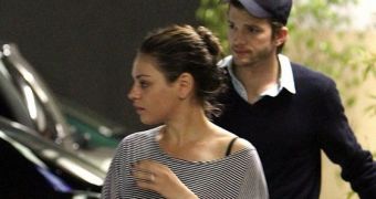 Mila Kunis and Ashton Kutcher are  now officially dating