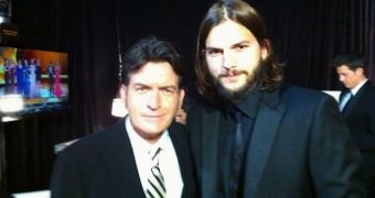 Charlie Sheen and Ashton Kutcher bond backstage at the Emmys 2011