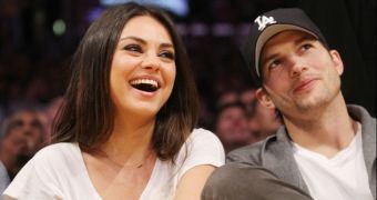 Mila Kunis and Ashton Kutcher are in no rush to get married even though they’re engaged, says pal