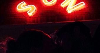 Mila Kunis and Ashton Kutcher share a romantic kiss in Twitter snap