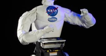 Robonaut B's upper body can attach to a Segway-built robotic mobility platform (RMP) in order to drive on Earth