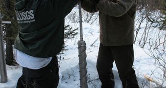 Researchers tap the arctic permafrost for soil samples that can be studied to assess their microbial composition and the impact of these populations by thawing conditions