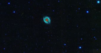 WISE image showing the Helix Nebula and asteroid, satellite and cosmic ray marks and streaks