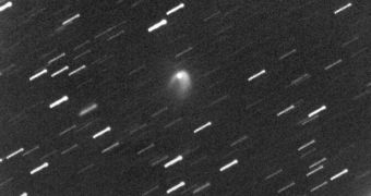 Asteroids 596Scheila Suddenly Turns into a Comet