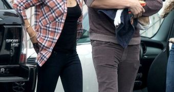 Mila Kunis stands by Ashton's side while taking their bulldog to be put down