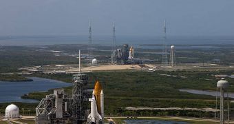 In one of the rarest sights in the world, the Endeavor and Atlantis space shuttles are seen being readied for take off at their respective launch pads