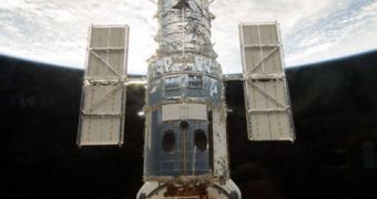 Hubble is seen here docked aboard Atlantis