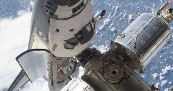 Shuttle Atlantis is seen here docked to the ISS during its last flight to the ISS, STS-132