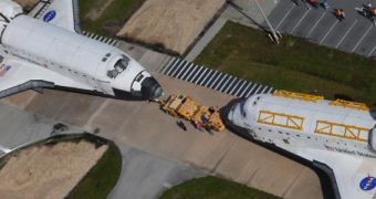 Atlantis (right) and Endeavour meet each other for the last time in front of the KSC OPF-3, on August 16, 2012
