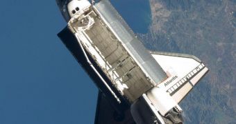 Shuttle Atlantis is seen in this November 25 photo as it undergoes undocking procedures. The photo is taken from the ISS