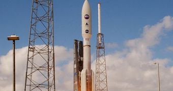 Atlas V rocket carrying the New Horizons mission to Pluto lifts off in this January, 2006, image