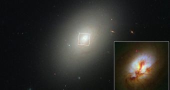 Hubble image showing the core of NGC 4150, with vast amounts of gas and dust on clear display